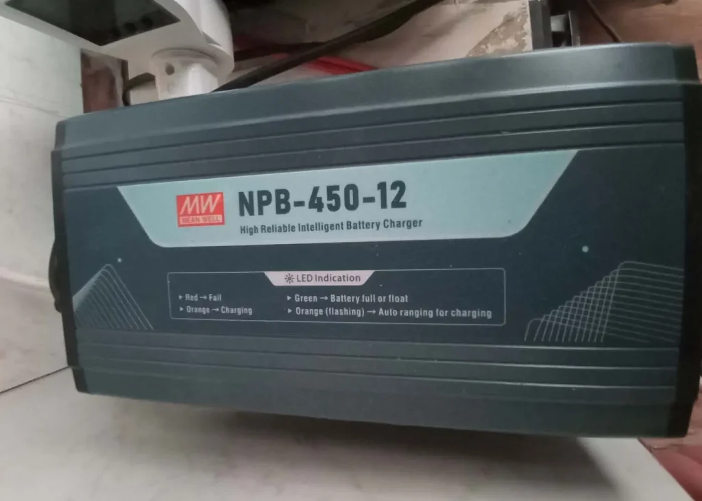 Mean Well NPB-450-12 smart battery charger used to recharge a 12V LiFePO4 battery for a hydroponic backup power system.
